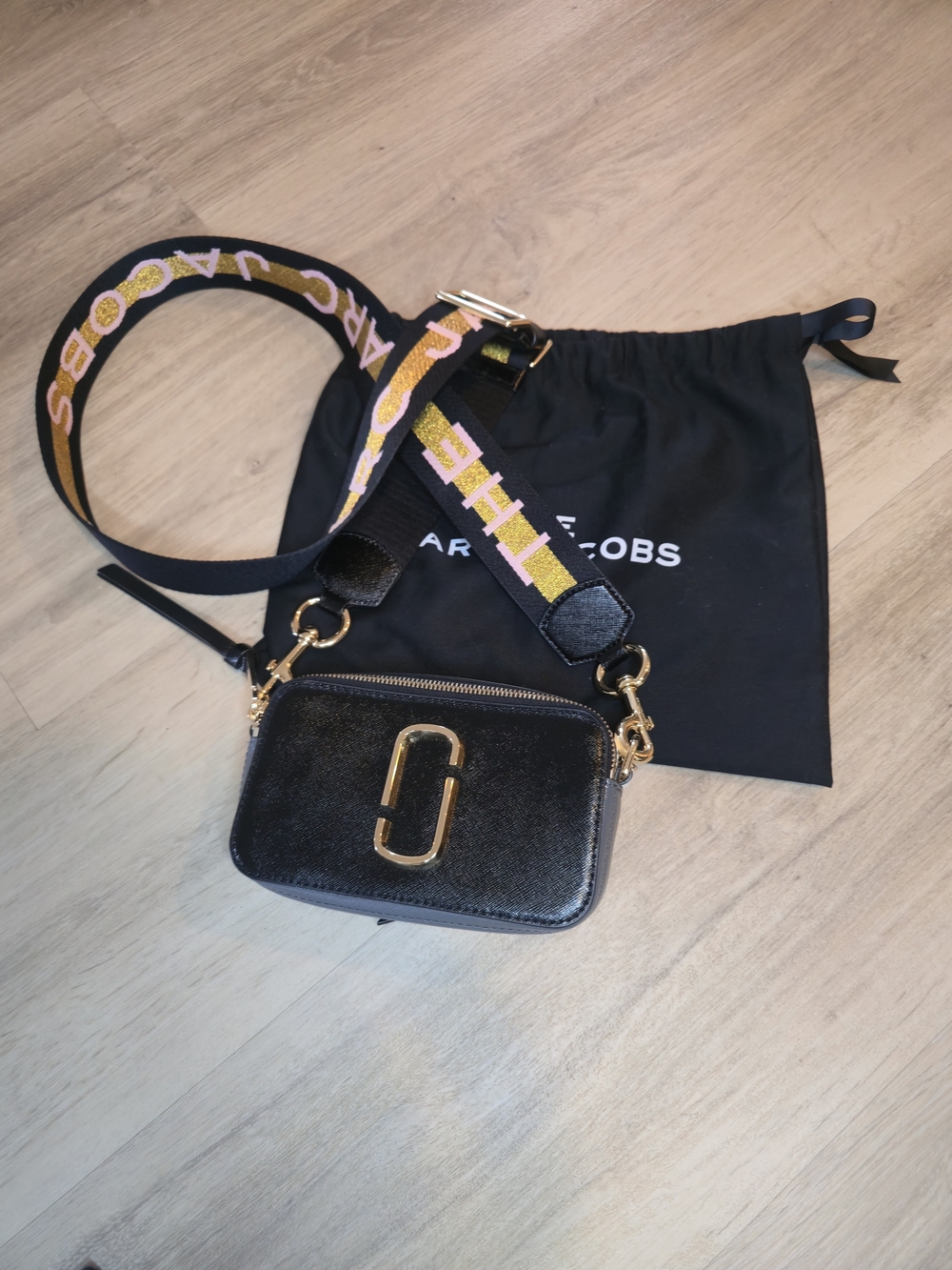 Marc Jacobs Black Snapshot Camera Bag with Branded Multi-Color Strap.